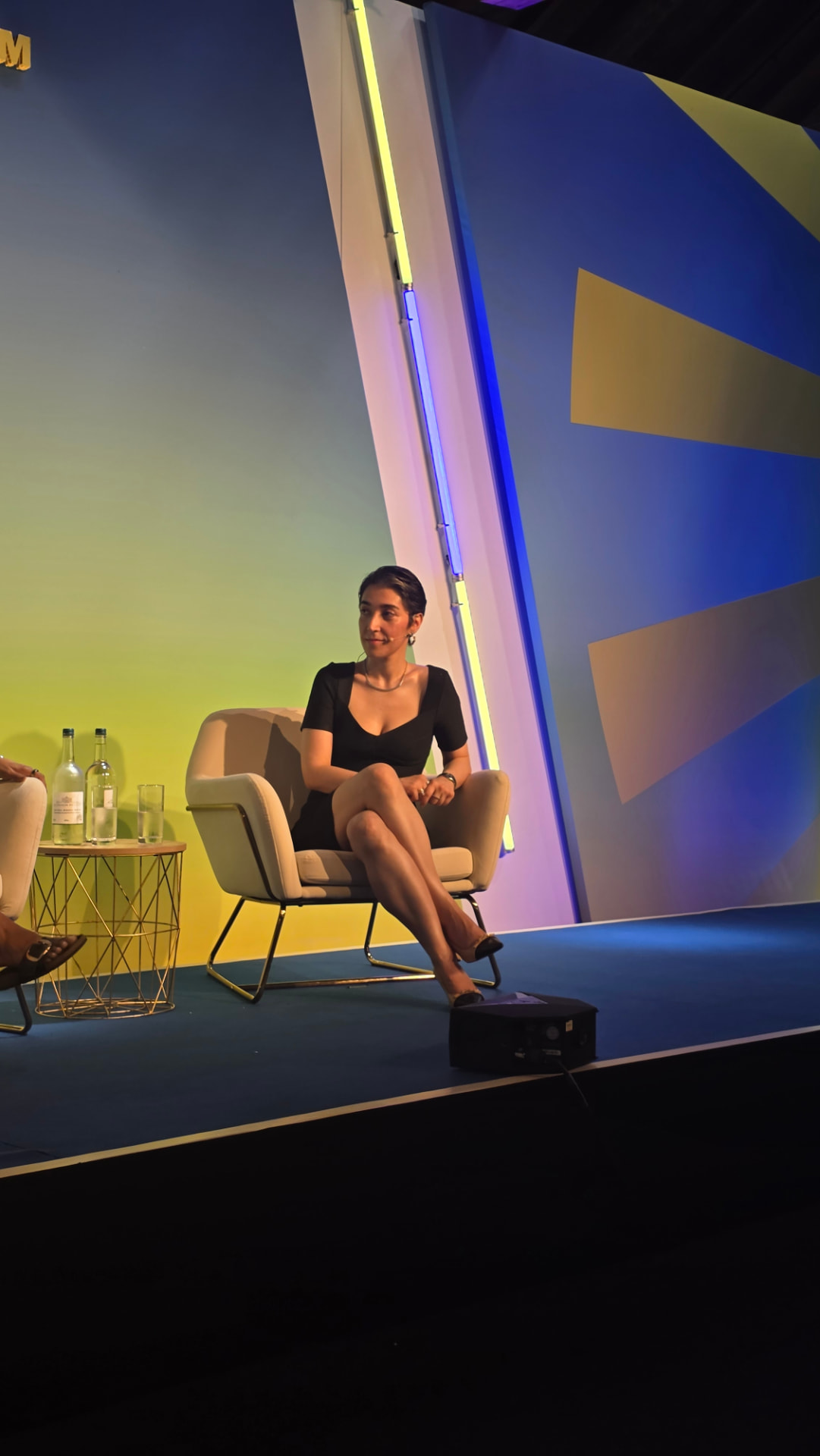 Dr Jasmine Sayyari speaking on stage